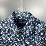Close-up detail shot of Louis Vuitton luxury clothing with everyday silhouette