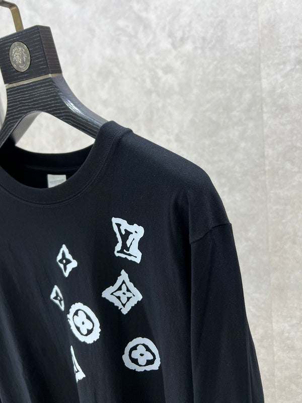 Full styled look of Louis Vuitton luxury clothing with logo-detail design