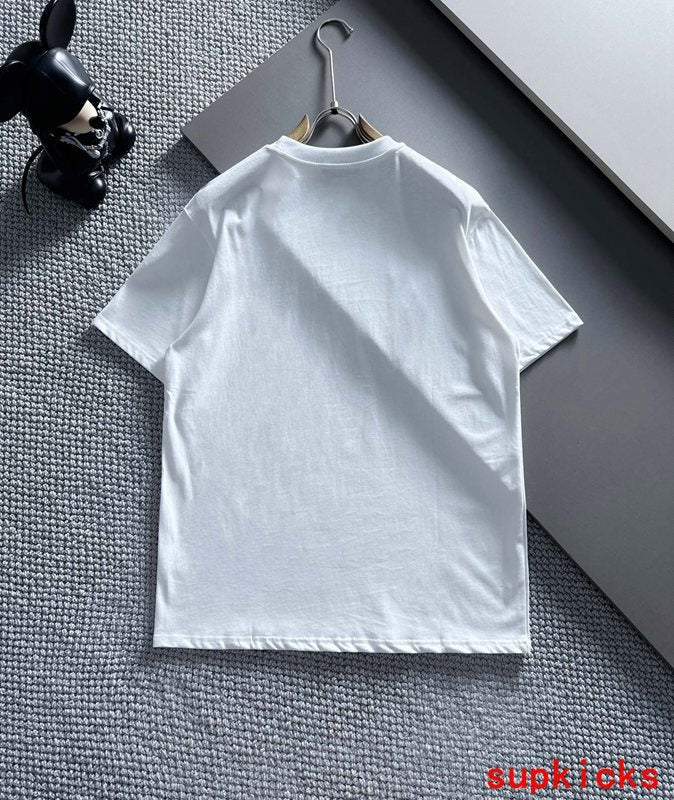 Close-up detail shot of Moncler luxury clothing with tailored silhouette
