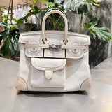 Side view of contemporary structured handbag