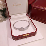 Front view of Cartier unisex jewelry piece