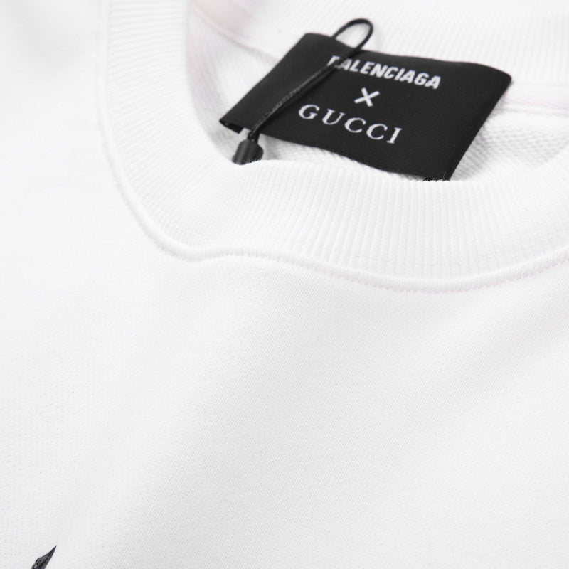 Close-up detail shot of Gucci luxury clothing with signature branding