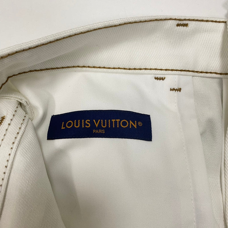 Side profile of Louis Vuitton luxury clothing with signature branding