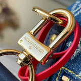 Handle and strap detail of statement modern women's handbag – women's designer-style accessory