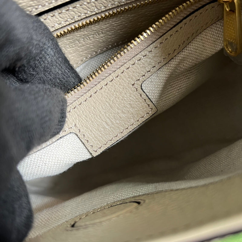 Close-up detail of signature refined women's handbag – women's luxury handbag