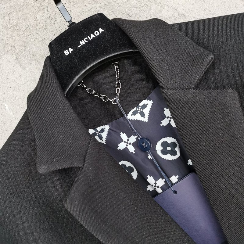 Full styled look of Louis Vuitton luxury clothing with logo-detail design