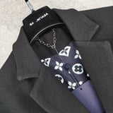 Full styled look of Louis Vuitton luxury clothing with logo-detail design