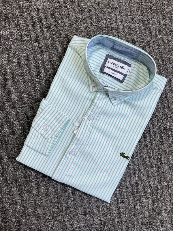 Full styled look of Lacoste luxury clothing with logo-detail design