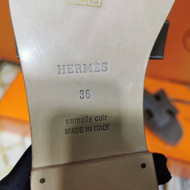 Hermès Camel Flat Thong Sandals - Toe Detail View
