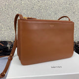 Side profile of premium signature women's handbag – women's premium purse