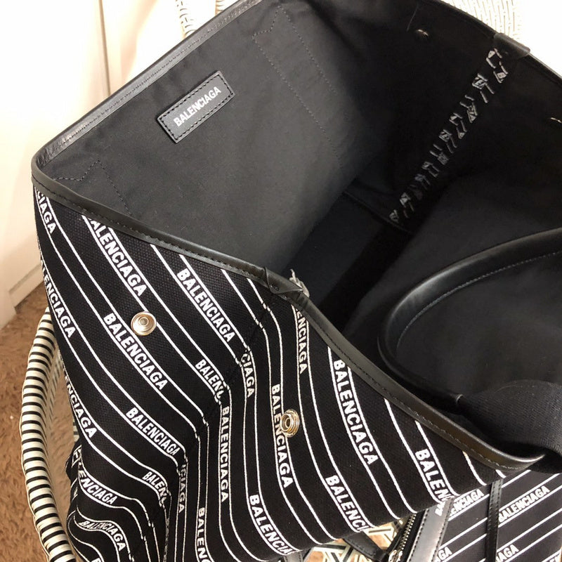 Styled lifestyle shot of refined signature women's handbag – women's premium purse