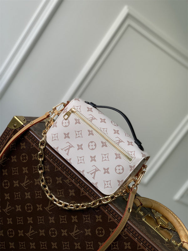  Understated crossbody bag carried on shoulder
