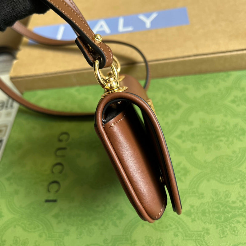 Handle and strap detail of refined chic women's handbag – women's designer-style accessory