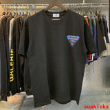 Front view of Rhude luxury clothing with tailored silhouette