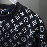 Full styled look of Louis Vuitton cotton t-shirt with signature branding