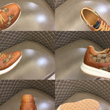 Side profile of Gucci two-tone sneakers sleek tonal finish