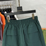 Front view of Rhude luxury clothing with logo-detail design