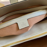 Side profile of chic structured women's handbag – women's premium purse