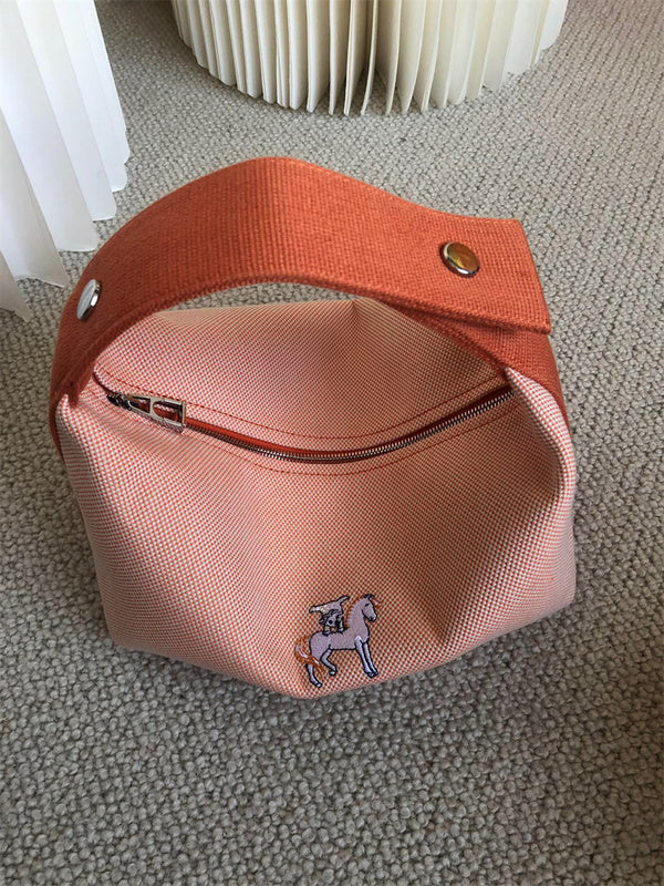  effortless top-handle bag styled with outfit