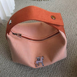  effortless top-handle bag styled with outfit