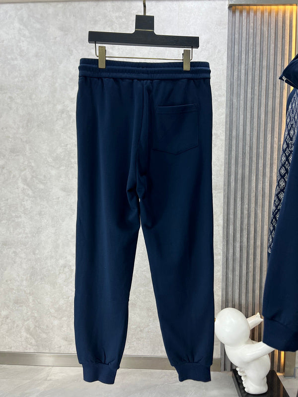 Close-up detail shot of Louis Vuitton luxury clothing with runway-inspired design