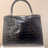 Side view of modernist structured handbag