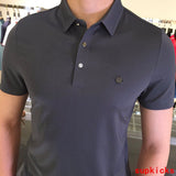 Front view of Moncler luxury clothing with contemporary cut