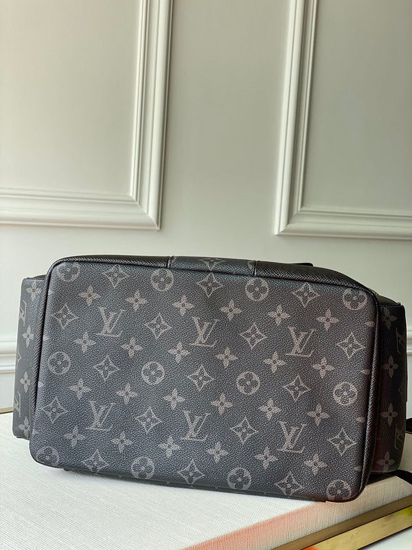 Handle and strap detail of classic signature women's handbag – women's designer-style accessory