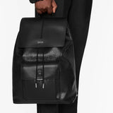 Side profile of sleek signature women's handbag – women's designer-style accessory