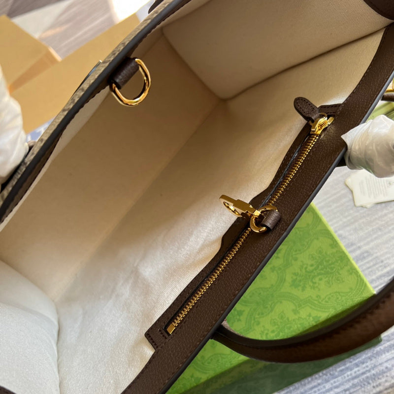 Side profile of polished elevated women's handbag – women's luxury handbag