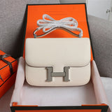 Side view of polished structured handbag