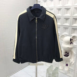Close-up detail shot of Louis Vuitton luxury clothing with tailored silhouette