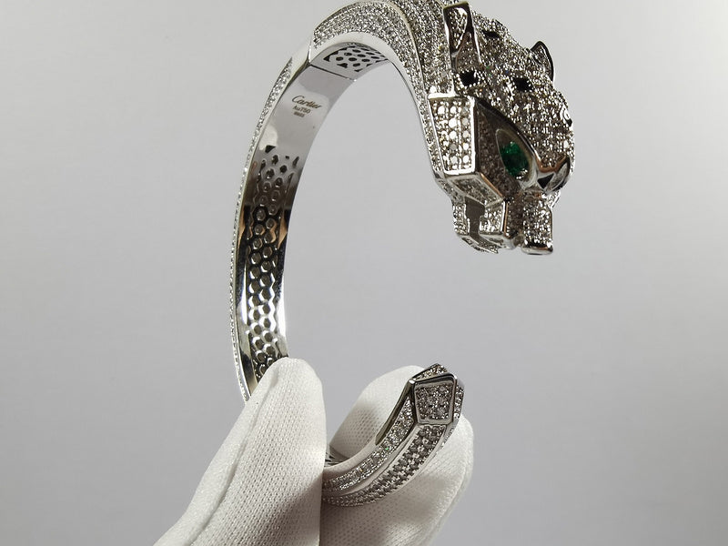 Close-up detail view of Cartier unisex jewelry piece