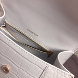 Side profile of statement refined women's handbag – women's premium purse
