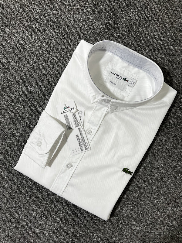 Close-up detail shot of Lacoste luxury clothing with logo-detail design