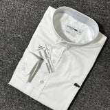 Close-up detail shot of Lacoste luxury clothing with logo-detail design