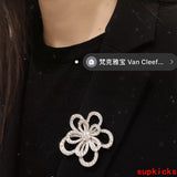 Front view of Van Cleef & Arpels unisex jewelry piece