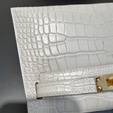Side view of polished structured handbag