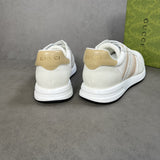 Side profile of Gucci stone beige sneakers premium leather build