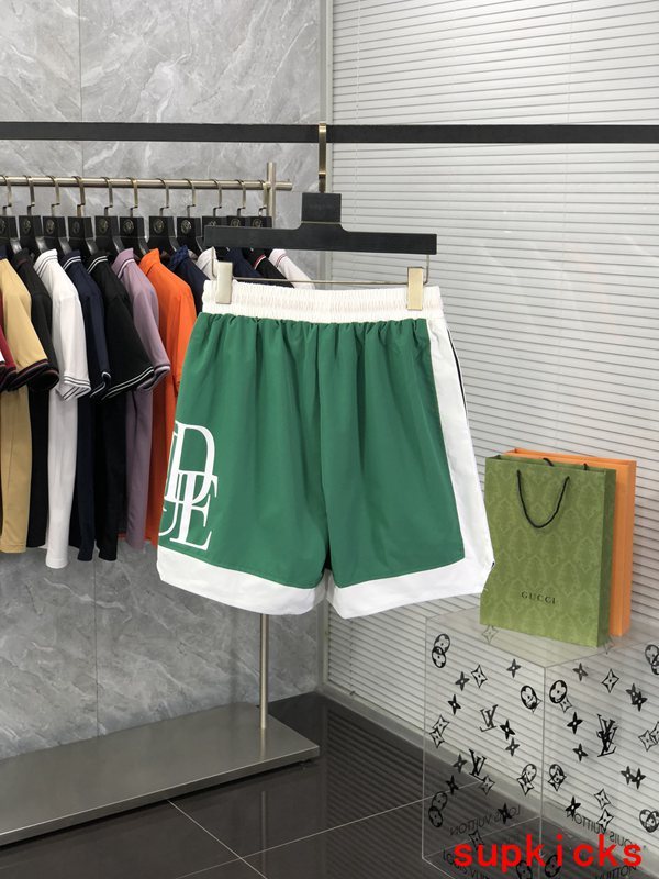 Side profile of Rhude luxury clothing with label-forward styling