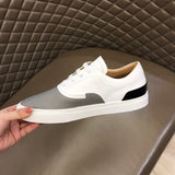 Hermès Chocolate Brown High-Top Sneakers - Heel Detail View