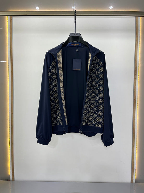 Back view of Louis Vuitton luxury clothing with label-forward styling