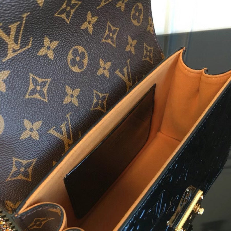 Styled lifestyle shot of elevated refined women's handbag – women's luxury accessory