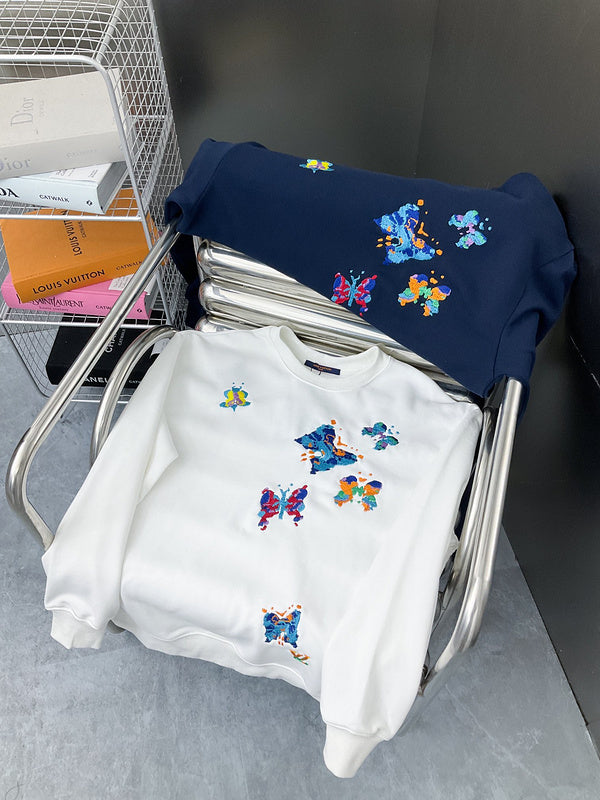 Back view of Louis Vuitton luxury clothing with label-forward styling