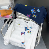 Back view of Louis Vuitton luxury clothing with label-forward styling