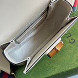 Side view of sculpted structured handbag