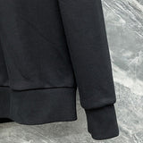 Back view of Louis Vuitton luxury clothing with signature branding
