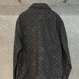 Side profile of Louis Vuitton luxury clothing with label-forward styling