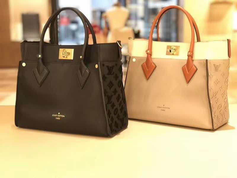  top-handle bag interior and compartment view 9