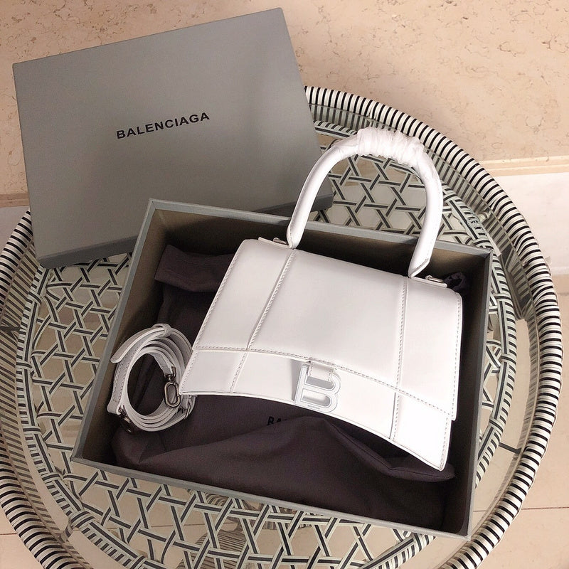 Side profile of premium refined women's handbag – women's statement bag